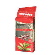 Eine vakuumverpackte Kaffeepackung für den Mokka Kaffee Kremoso Arabica Top Selection. Die Verpackung ist in den Farben rot/gold/rot gehalten. Der Schriftzug Caffè Kremoso in roten Großbuchstaben befindet sich in der Mitte der Packung aufgedruckt. Darunter ist eine Kaffeepflanze mit grünen Blättern abgebildet.