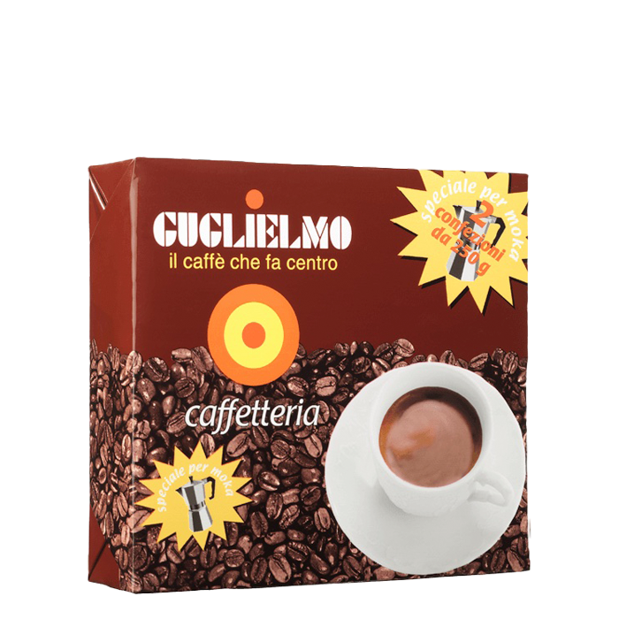 Eine braune Vakuumverpackung für den gemahlenen Mokka Kaffee Guglielmo Caffetteria. Links oben sieht man das Logo von Guglielmo mit dem orange, gelb, roten konzentrischen Kreis. Darunter ist eine kleine Aluminium Mokkakanne abgebildet. Darüber befindet sich der weiße Schriftzug Caffetteria. Rechts unten ist eine weiße Kaffeetasse zu sehen.