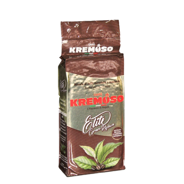 Eine vakuumverpackte Kaffeepackung für den Mokka Kaffee Kremoso Elite Gran Riserva. Die Verpackung ist in den Farben braun/gold/braun gehalten. Der Schriftzug Caffè Kremoso in roten Großbuchstaben befindet sich in der Mitte der Packung aufgedruckt. Darunter ist eine Kaffeepflanze mit grünen Blättern abgebildet.