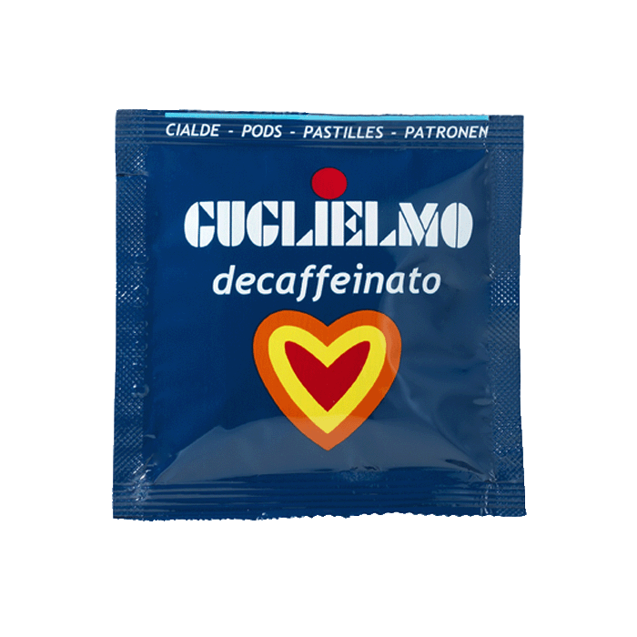 Eine blaue Aromaverpackung für den koffeinfreien Kaffee Guglielmo Dek als E.S.E. Pad. In der Mitte befindet sich ein Herz in den Farben orange, gelb und rot.