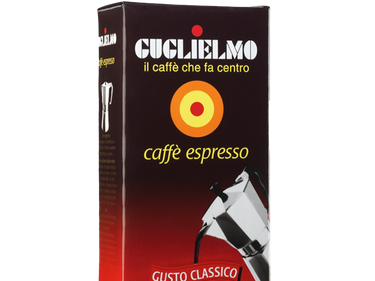 Eine Vakuumverpackung für den gemahlenen Mokka Kaffee Guglielmo Classico mit hellrot bis dunkelrotem Farbverlauf. Oben sieht man den weißen Schriftzug Guglielmo il caffè che fa centro, darunter das Logo mit dem orange, gelb, roten konzentrischen Kreis. In der Mitte steht caffè espresso. Darunter ist eine schräge Aluminium Mokkakanne abgebildet. Unten die Aufschrift Gusto Classico.